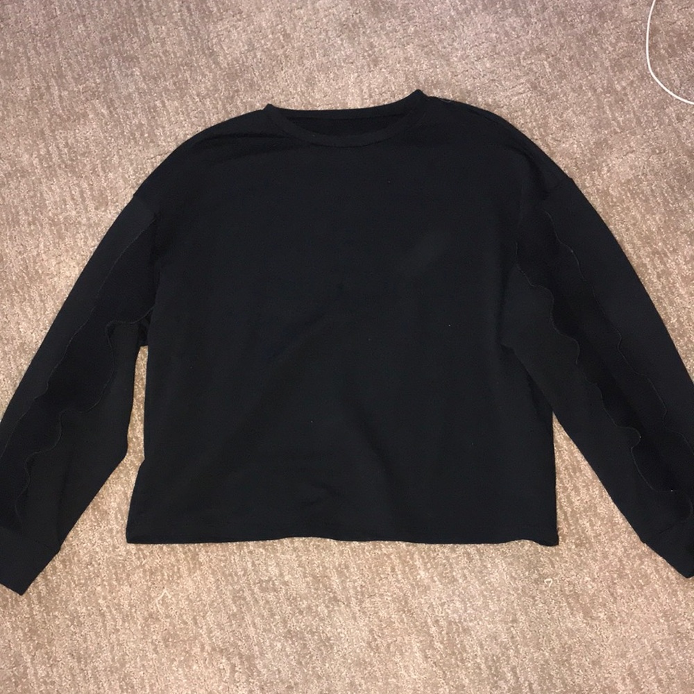 Perfect black sweater with ruffle sleeves